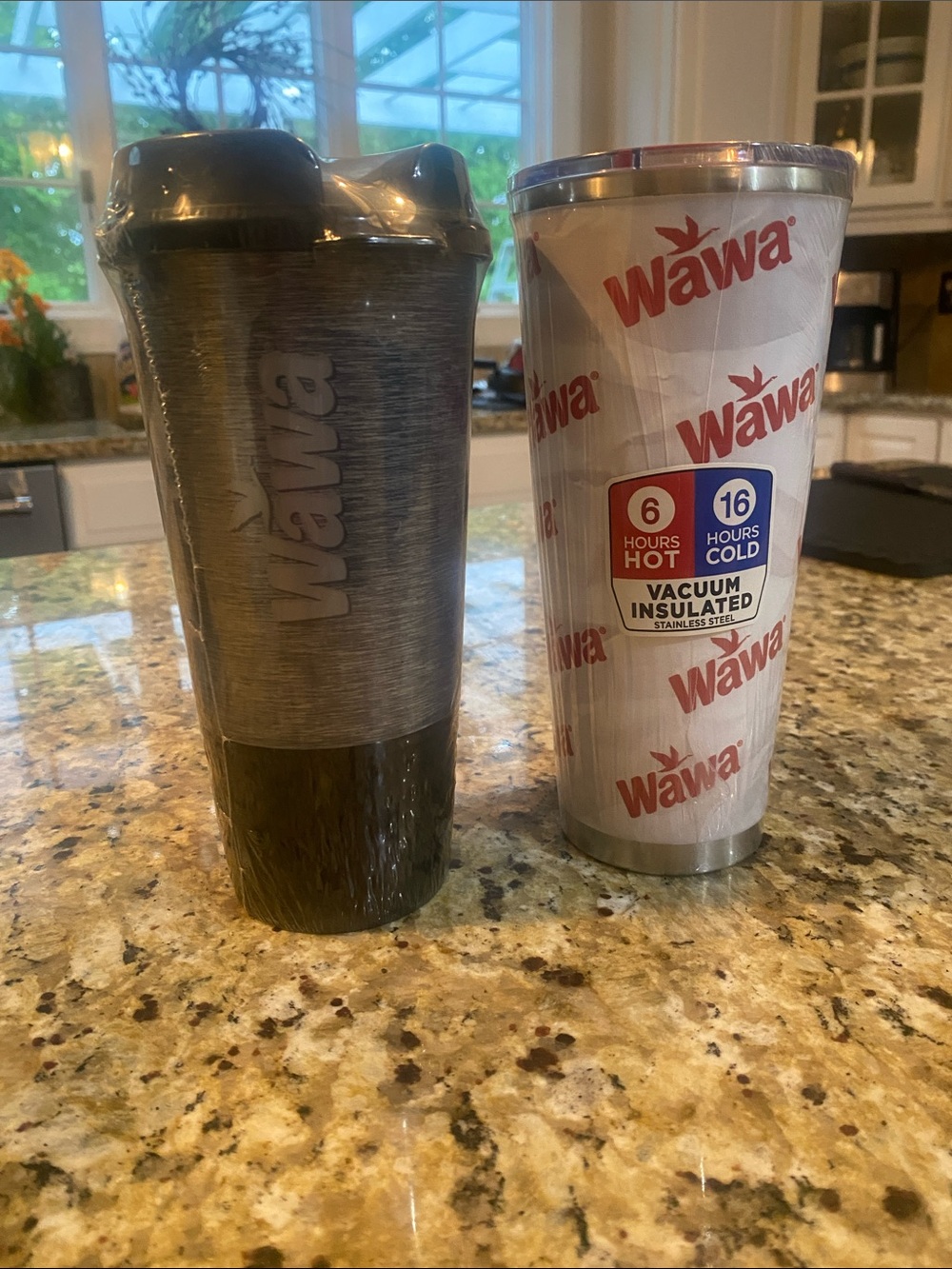 Wawa Stainless Steel Vacuum Tumbler - and a Black & Silver heavy plastic
